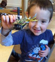 Child holding electronics