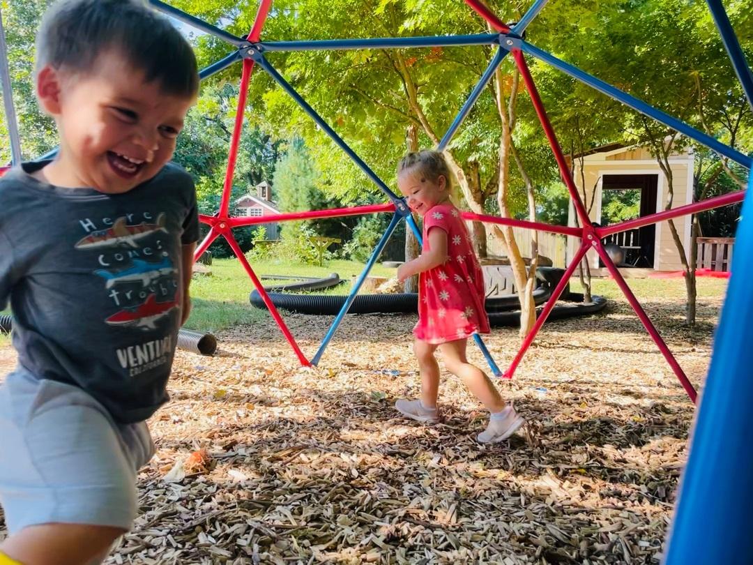 Children playing on a jungle gym